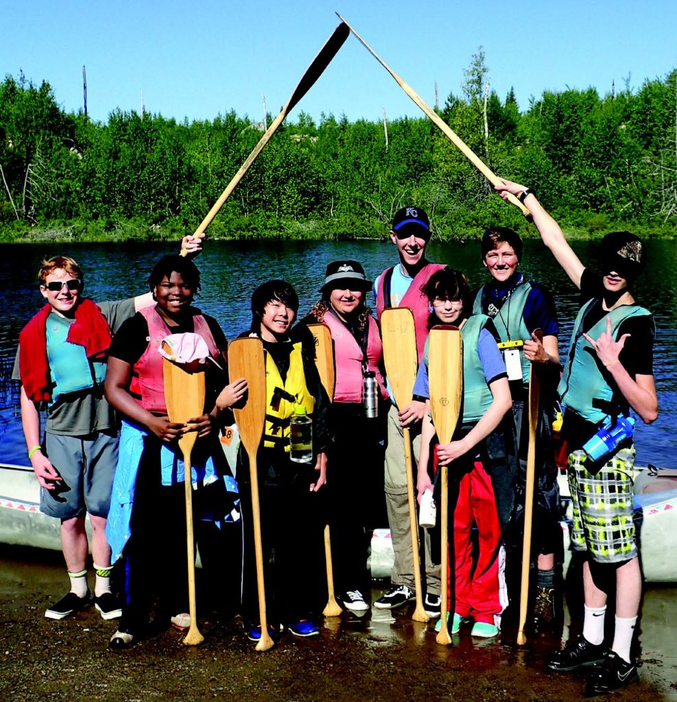 PS students posing for a group photo before setting off on their canoe trip