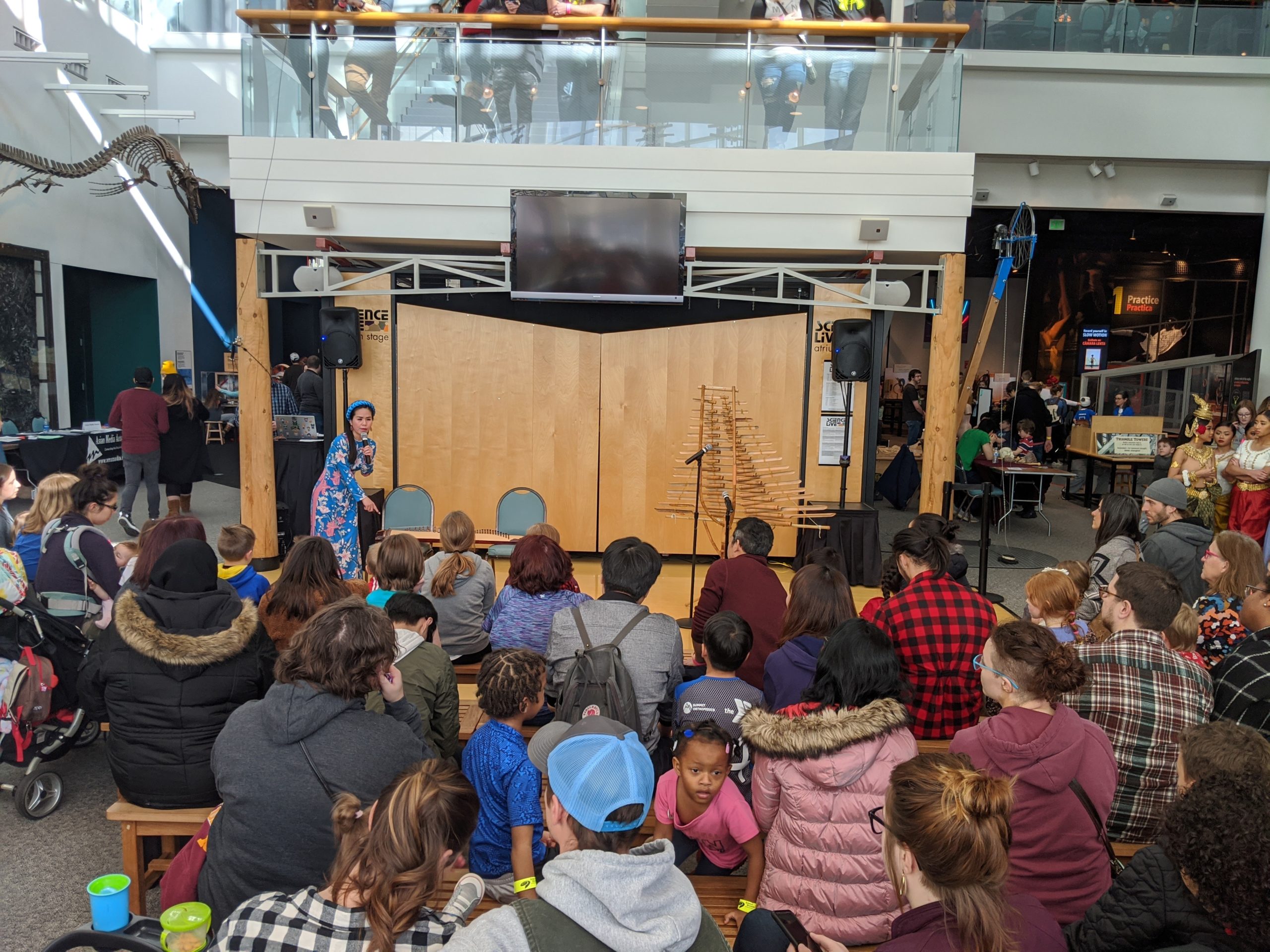 Students watching a science museum performance