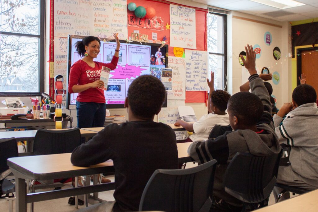 PS Facilitator interacts with students in the classroom