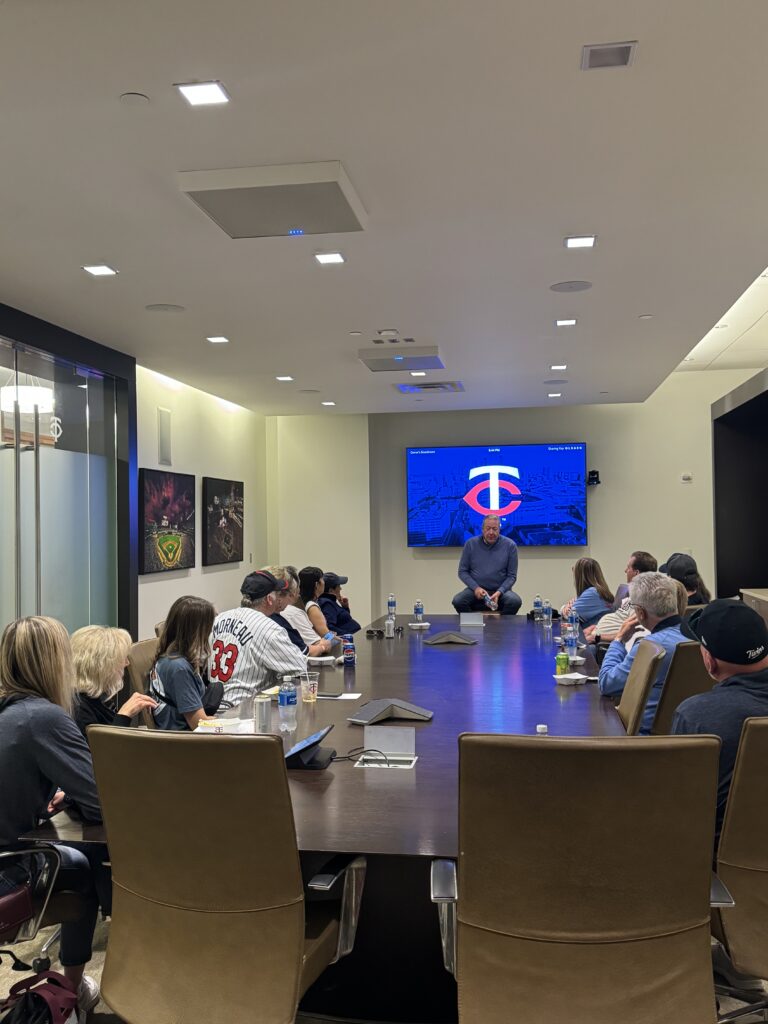 A group of sponsors in the Twins boardroom for Chalk Talk.