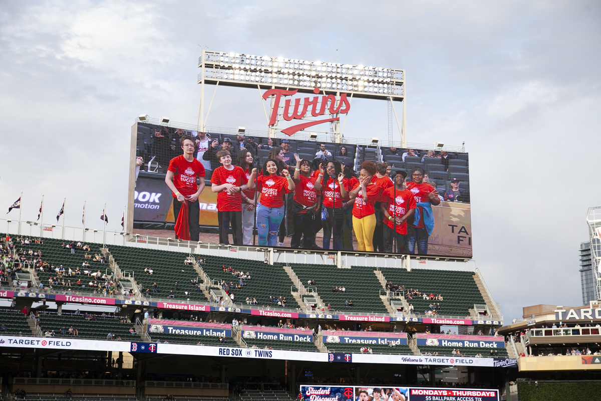 Students on the jumbotron.