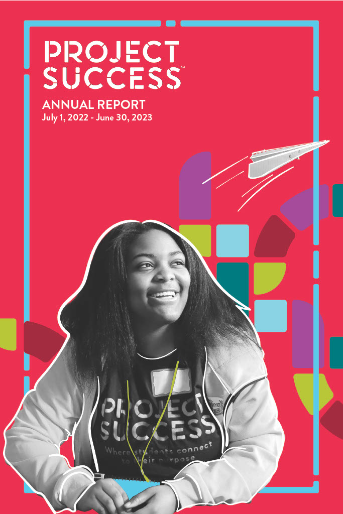 Cover of annual report with student smiling.