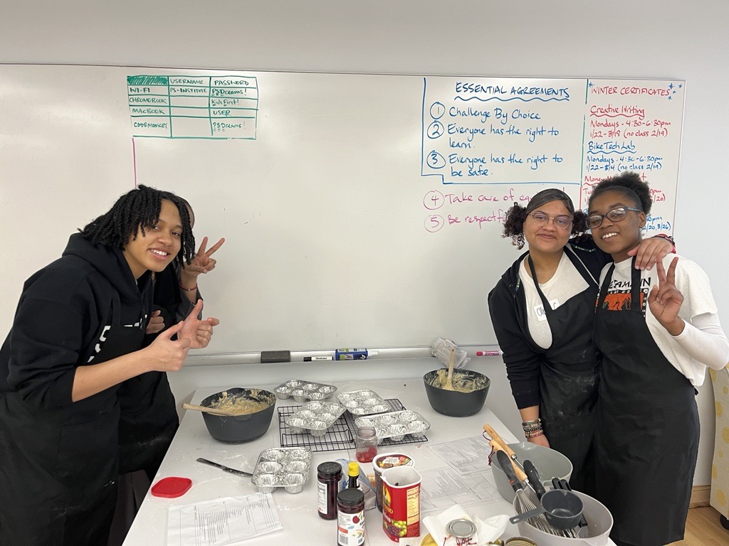 PS Students baking muffins in the institute