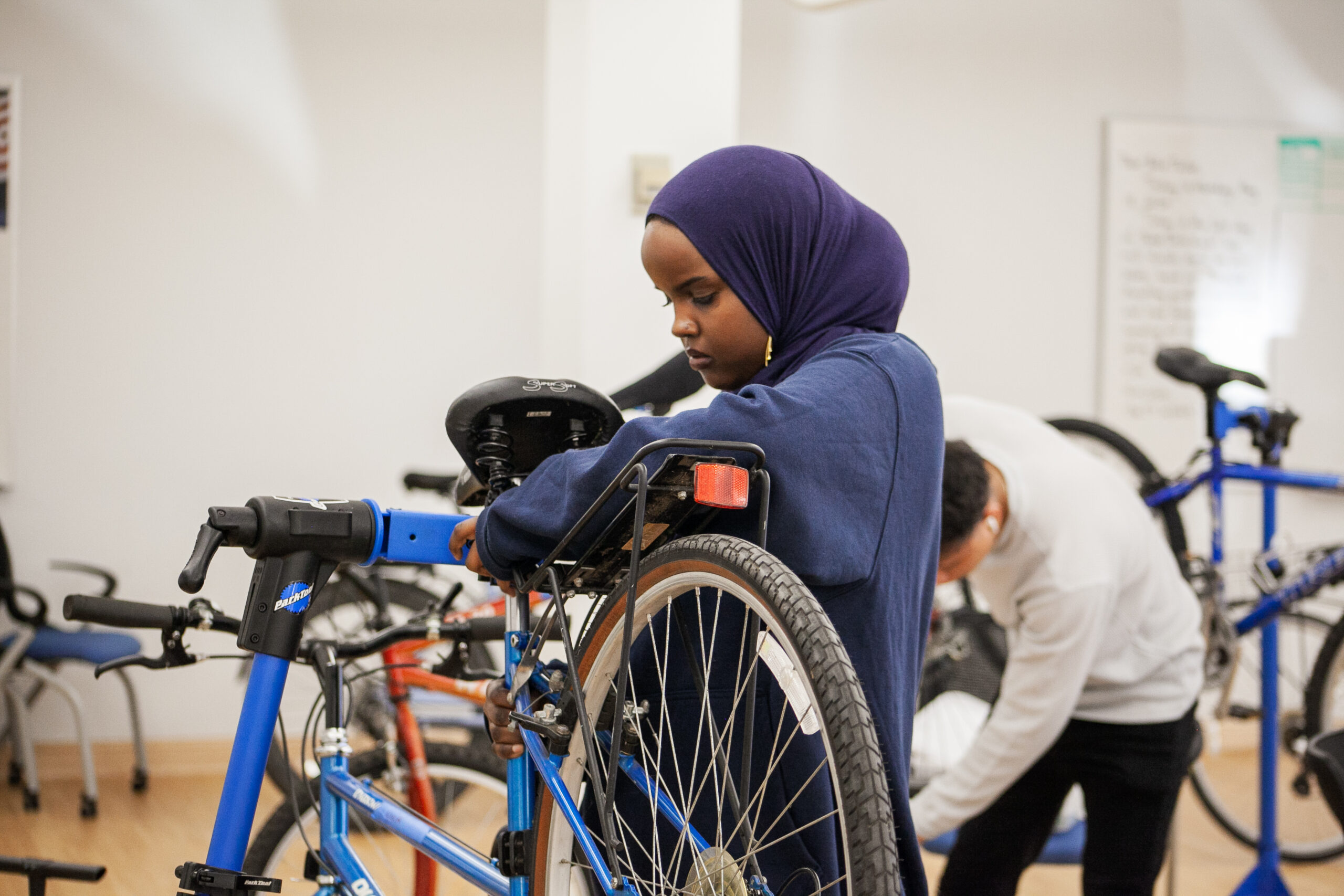 PS student working on a bicycle in the Bike Tech Institute Certificate