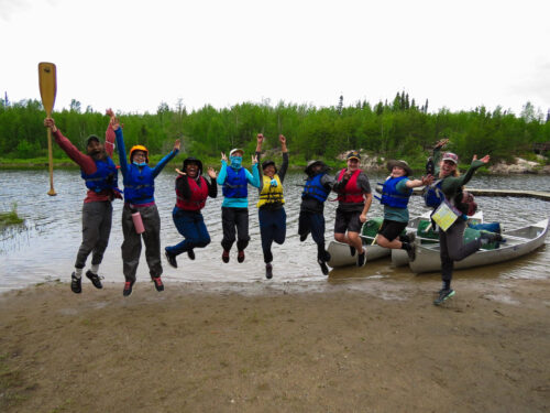 PS students jumping in Boundary Waters