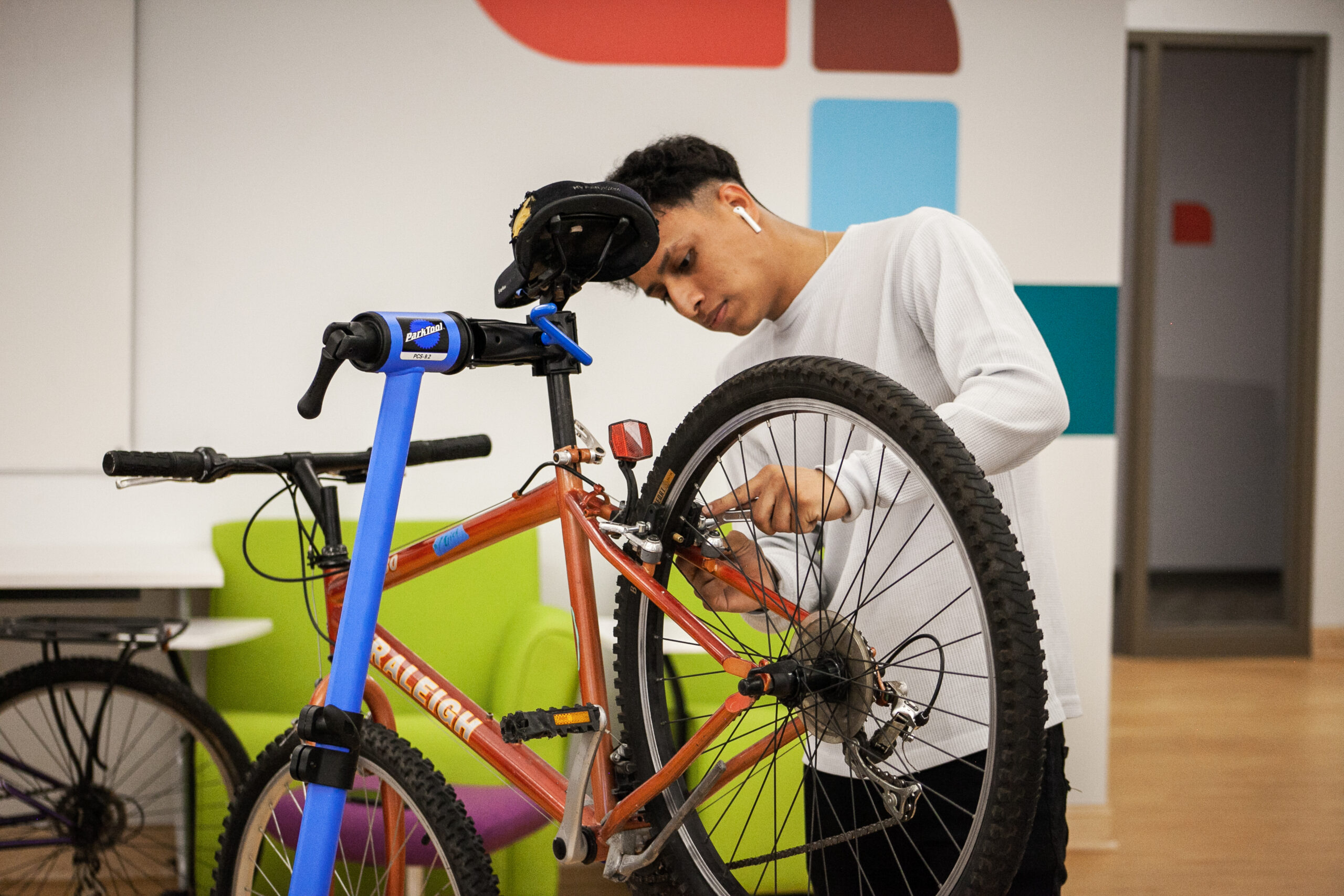 PS student working on a bicycle