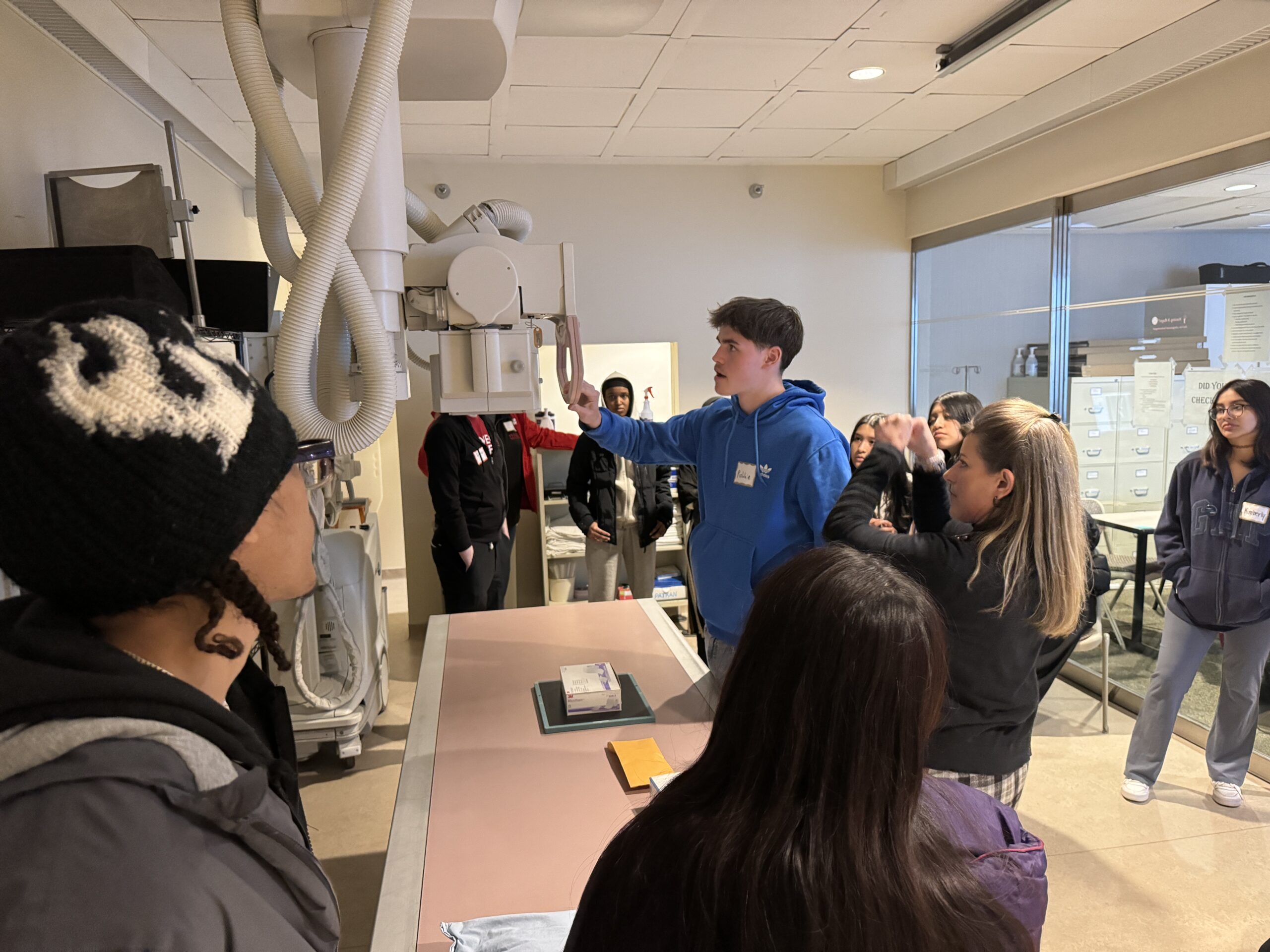 Students exploring a medical lab space